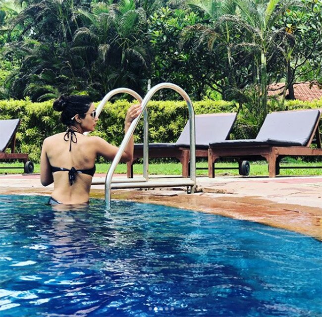 Image: http://st1.photogallery.ind.sh/wp-content/uploads/indiacom/hina-khan-stuns-in-a-black-monokini-201807-1530543689.jpg Hina Khan Stuns in a Black Monokini