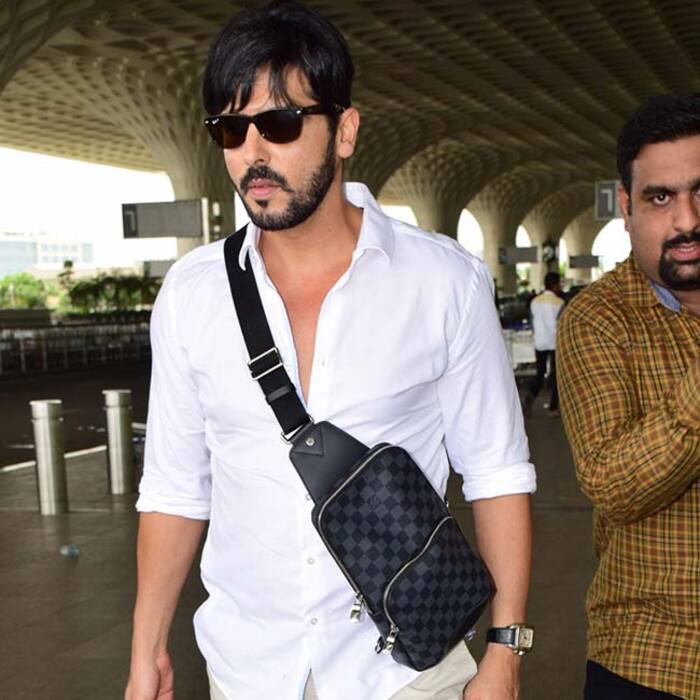 Zayed Khan looked dapper in white. He ha...