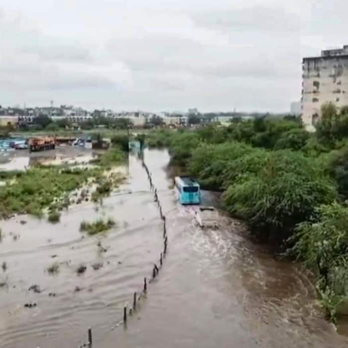 A drone visual of a waterlogged road at Ghazipur Mandi area following heavy rainfall, in New Delhi