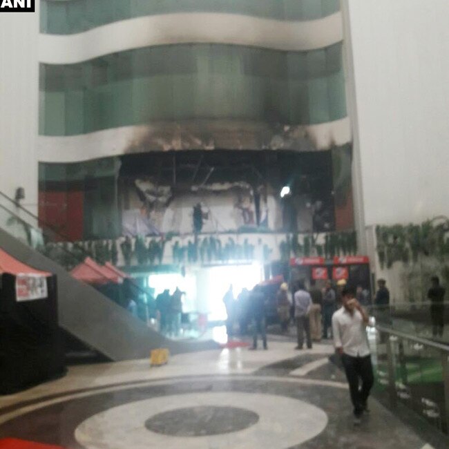 PICS M S Dhoni and team Jharkhand team safely evacuated after fire