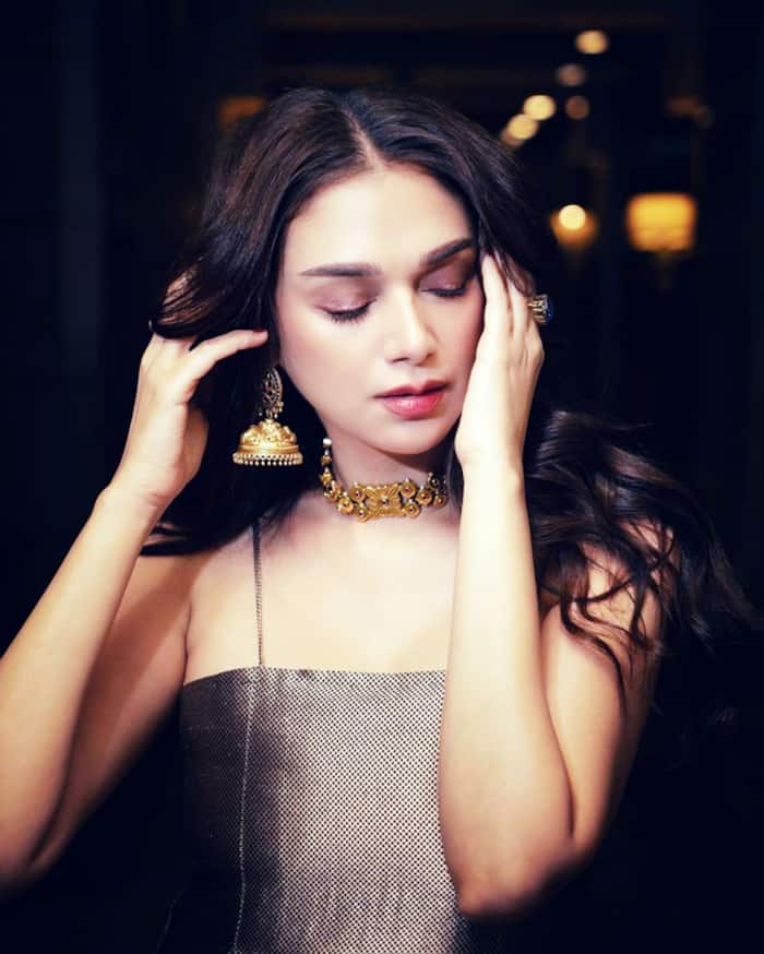 Aditi Rao Hydari Exudes Regal Charm in Metallic Suit Set
