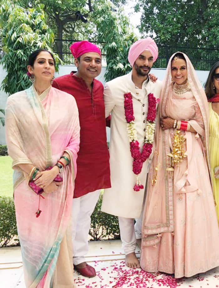 Ajay Jadeja with Wife Aditi during Neha Dhupia Angad Bedi Wedding