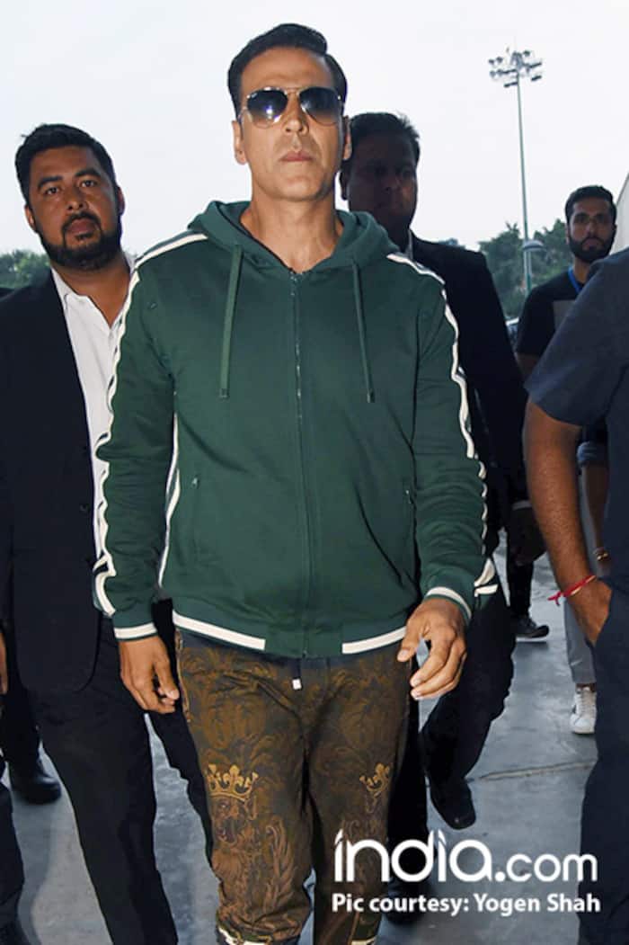 Akshay Kumar in dark green sweat shirt