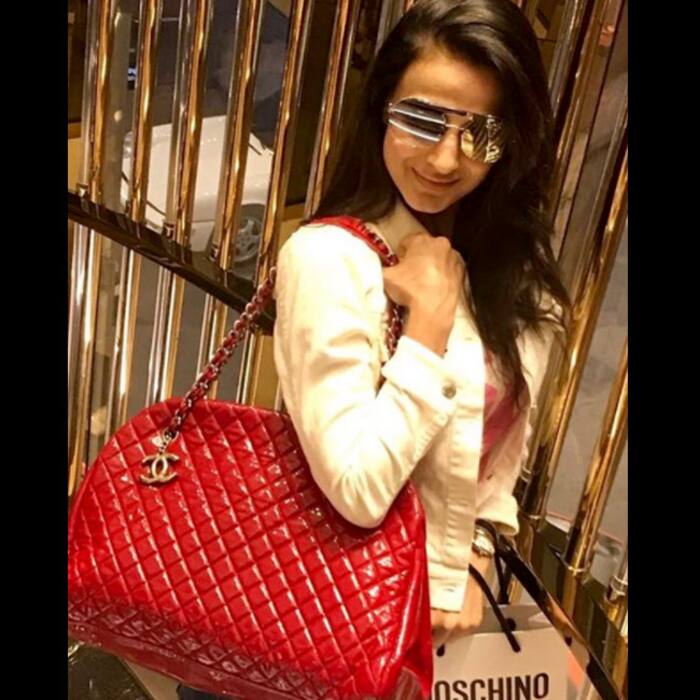 Ameesha Patel flaunts her red handbag