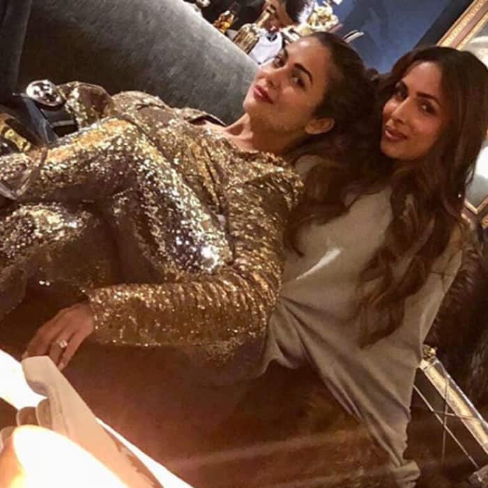 Amrita Arora snapped with sister Malaika Arora during the party