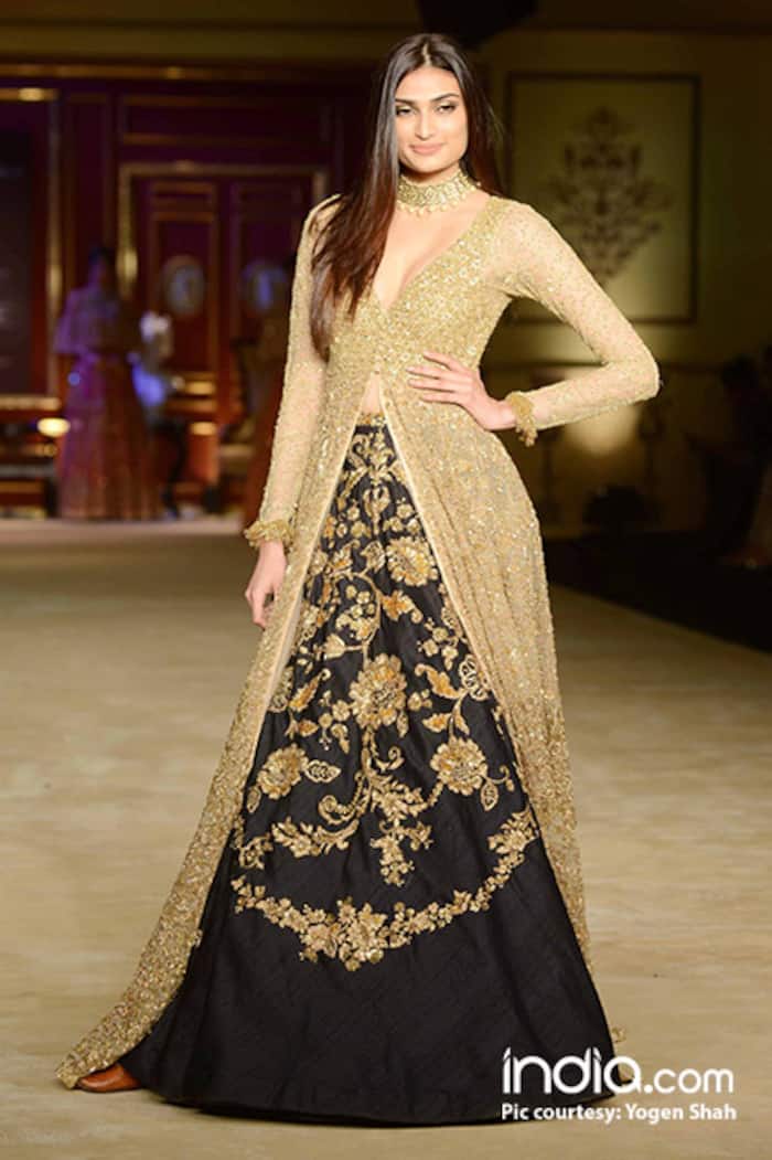 Athiya Shetty posing for shutterbugs as show stopper of Indian Couture Week 2017