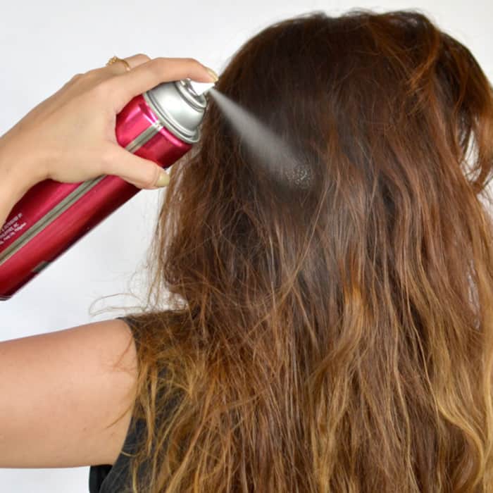 Avoid using hairstyling products and equipment to get rid of split ends