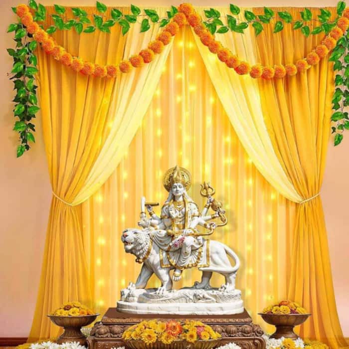 Chaitra Navratri 2026: Yellow fabric decoration idea with lights and flowers