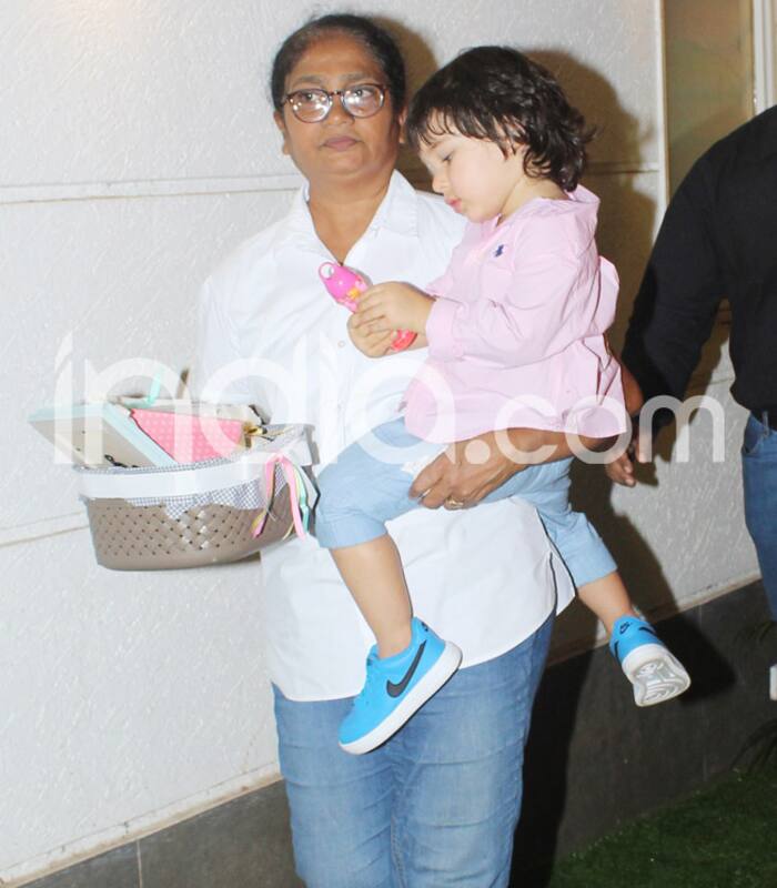 Cute little Taimur Busy Playing With Toy