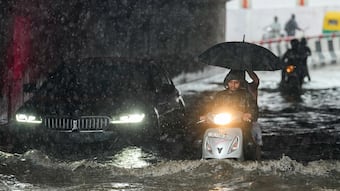 In Photos: Heavy rainfall brings Delhi-NCR to a halt; Noida battles waterlogging, traffic snarls