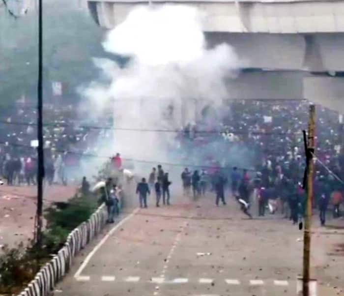 Demonstrators Turn Violent, Throw Stones at Police Personnel