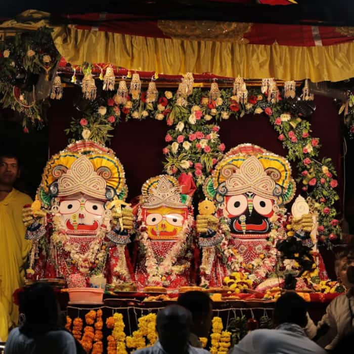 Devotees offer heartfelt prayers along the route during Rath Yatra