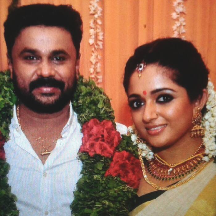 Dileep and Kavya Madhavan pose for a picture during their weddingfunction