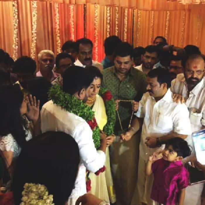 Dileep and Kavya Madhavan snapped during their wedding ritual