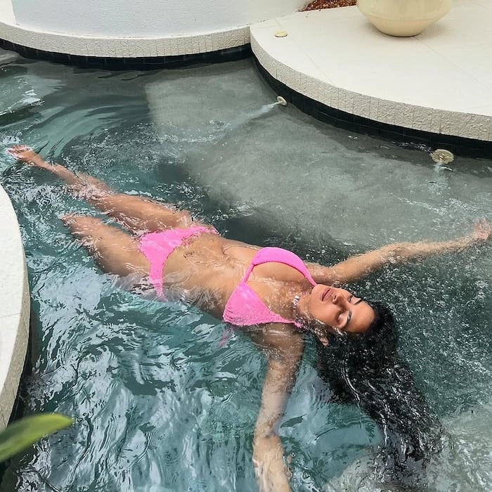 Enjoying The Water In A Pink Bikini