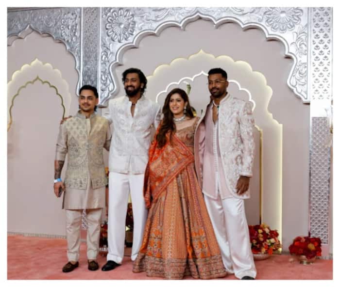 (From L) Ishan Kishan, Krunal Pandya, his wife Pankhuri Sharma and Hardik Pandya at Anant Ambani and Radhika Merchants wedding.