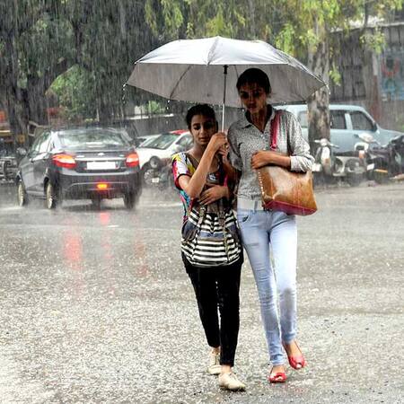 Rain lashes in parts of India, people get relief from heat