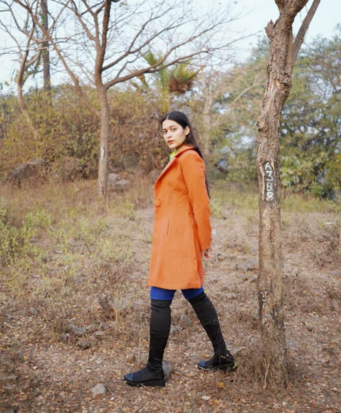 Giti Shares Picture in Orange Overcoat