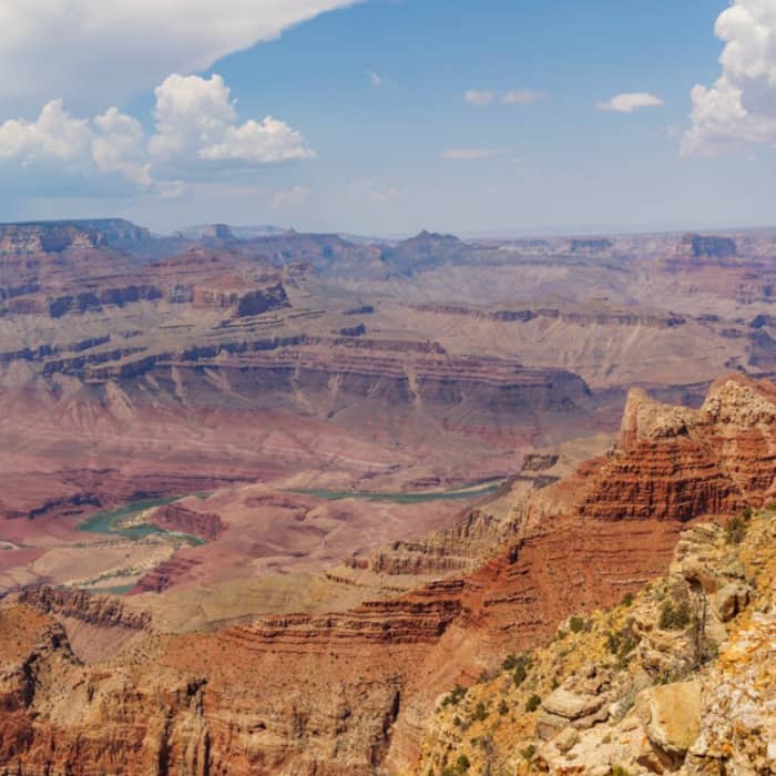 Grand Canyon is famous for its immense layered canyon carved by the Colorado River.