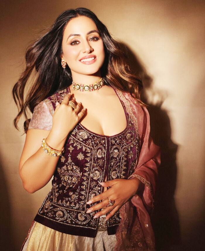 Hina Khan is a beauty personified in her maroon blouse with golden lehenga