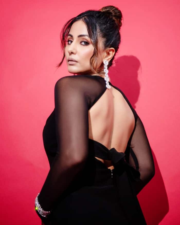 Hina Khan ups the glam quotient in a black cut-out gown with a deep-plunging neckline
