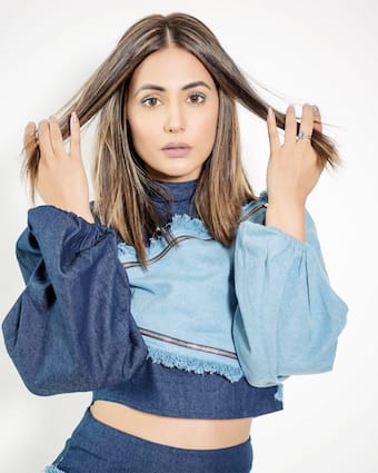 hina khan denim dress Hina Khan slays Disney vibes in halter-neck Donald-Mickey dress, denim jacket