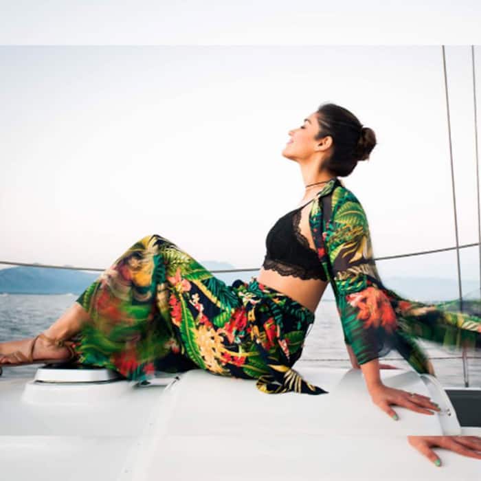 Ileana D’cruz posing on a tender amid sea in Fiji
