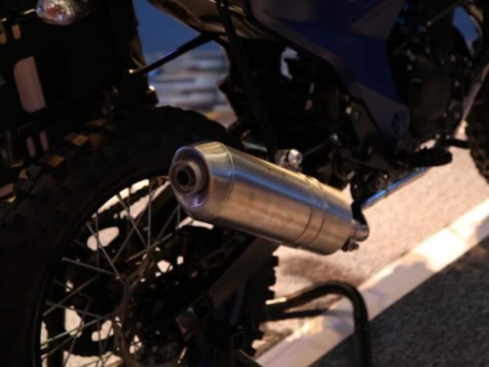 It wears spoke wheels that wears off-road tyres and disc brakes to improve its braking capabilities. It has an impressive ground clearance and since company has not revealed its technical specs, we assume that it to be not less than 170. The Upswept exhaust muffler gives an impressive look to the rear profile.
