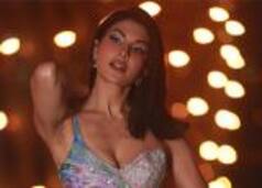 Jacqueline Fernandez Raises Mercury in Multi-Coloured Thigh-High-Slit Gown