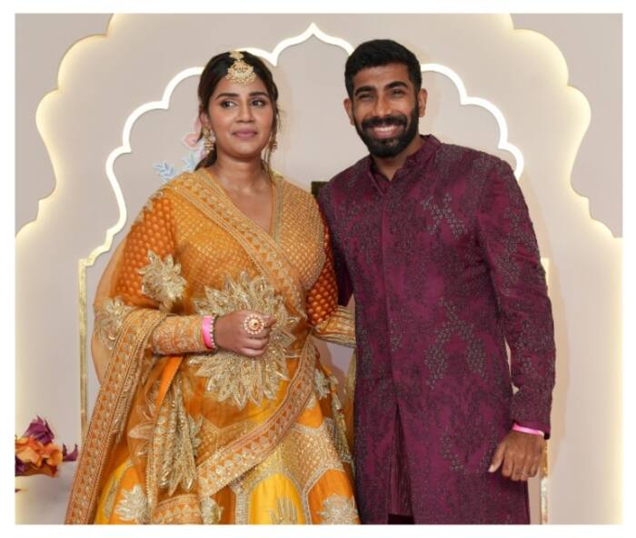 Jasprit Bumrah and his wife Sanjana Ganesan at Anant Ambani-Radhika Merchant wedding.