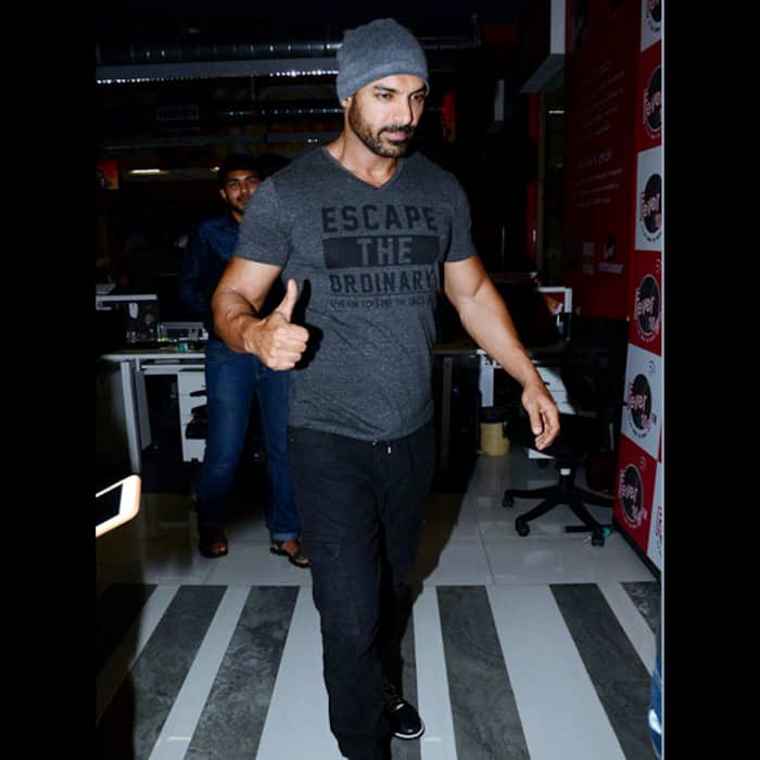 John  Abraham in  quote tee-shirt