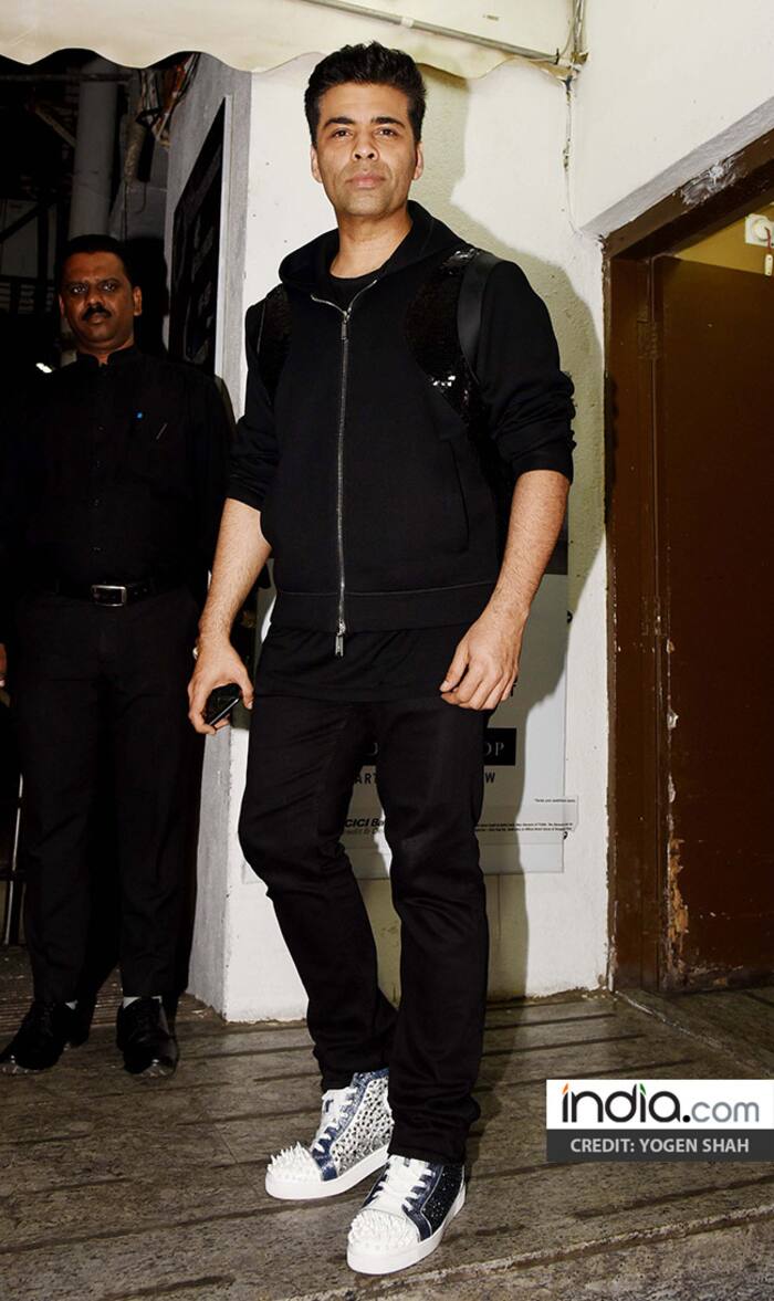 Karan Johar arrives for Raazi screening