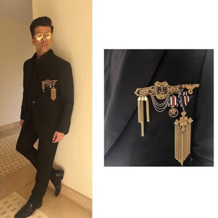 Karan Johar poses for a stylish picture