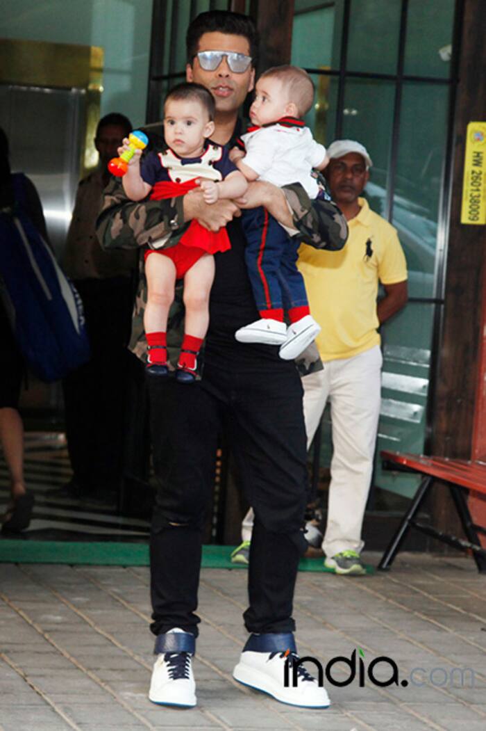 Karan Johar with his kids Yash and Roohi at Arpita Khan’s Christmas bash