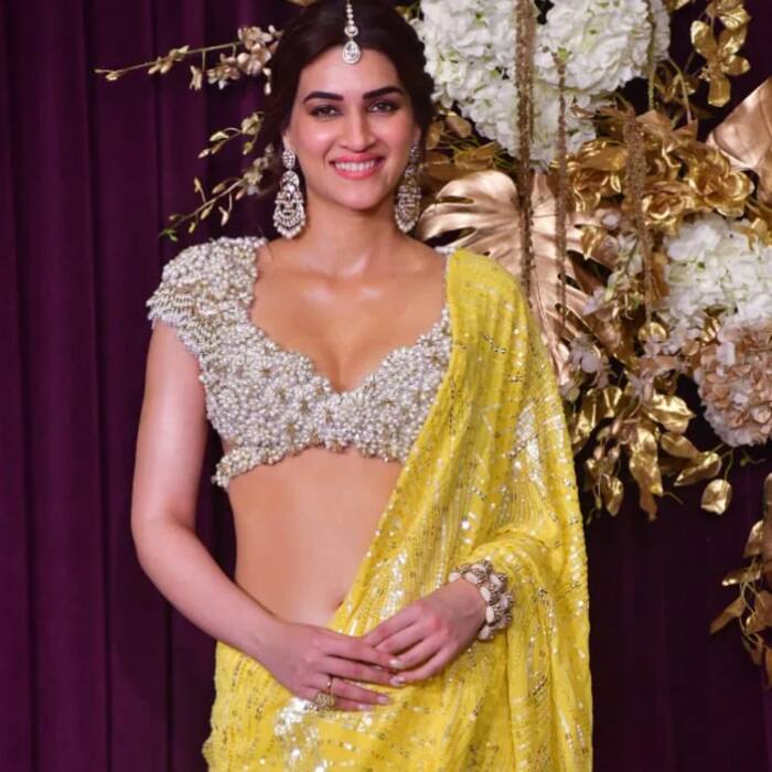 Kriti Sanon shines like a sun flower in a blingy yellow saree