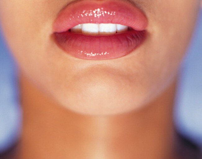 Line your lips with concealer after applying lipstick