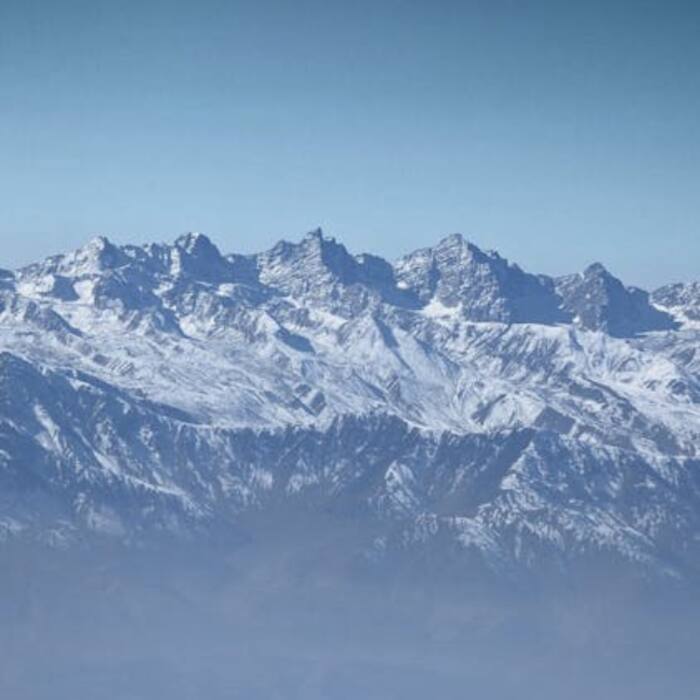 Makalu is easily recognized by its distinct four-sided pyramidal shape and isolated location.