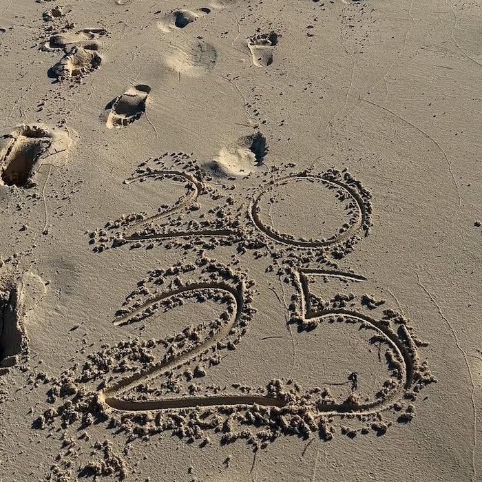 Marking The Year 2025 In The Sand