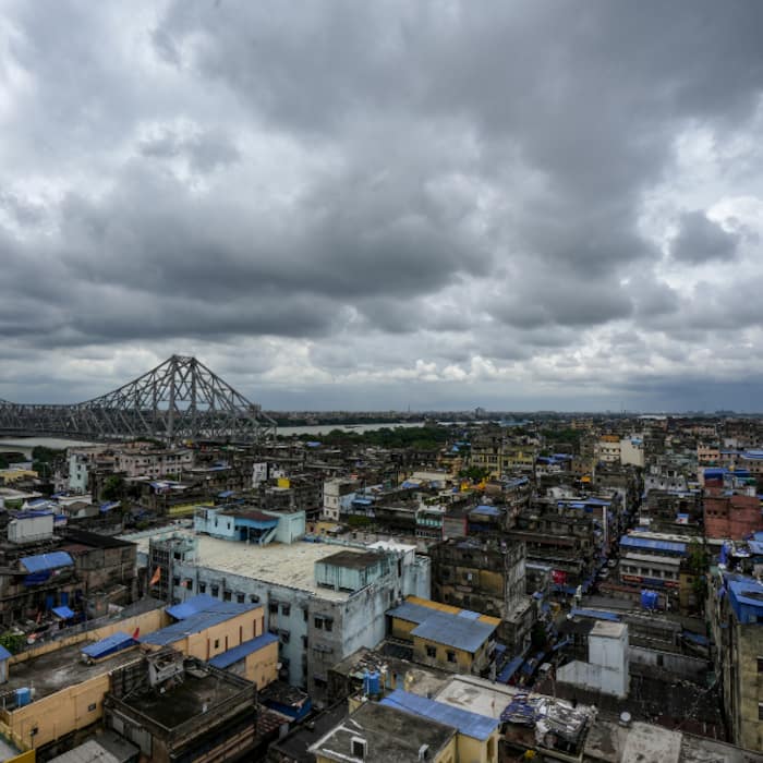 Monsoon clouds cover the skyline above the Howrah Bridge amid overcast conditions, in Kolkata, West Bengal