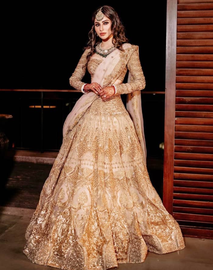 mouni-roy-is-a-golden-goddess-in-her-falguni-and-shane-lehenga-for-post