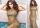 Mouni Roy Looks Hot And Sultry in Body-hugging Shimnmery Golden Gown