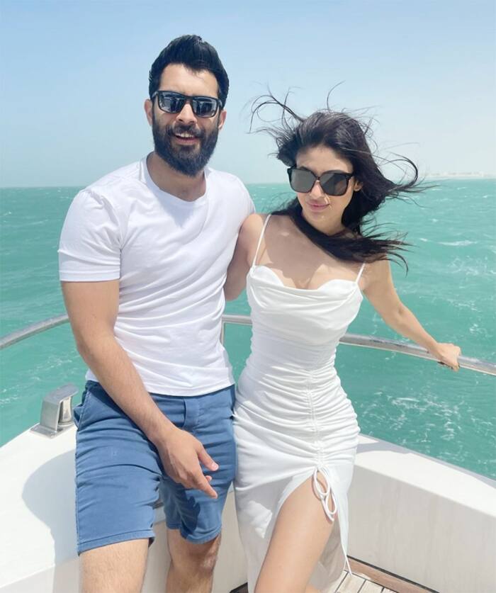 I'm Ru Raj Mouni Roy looks sexy in white body con dress with sexy neckline