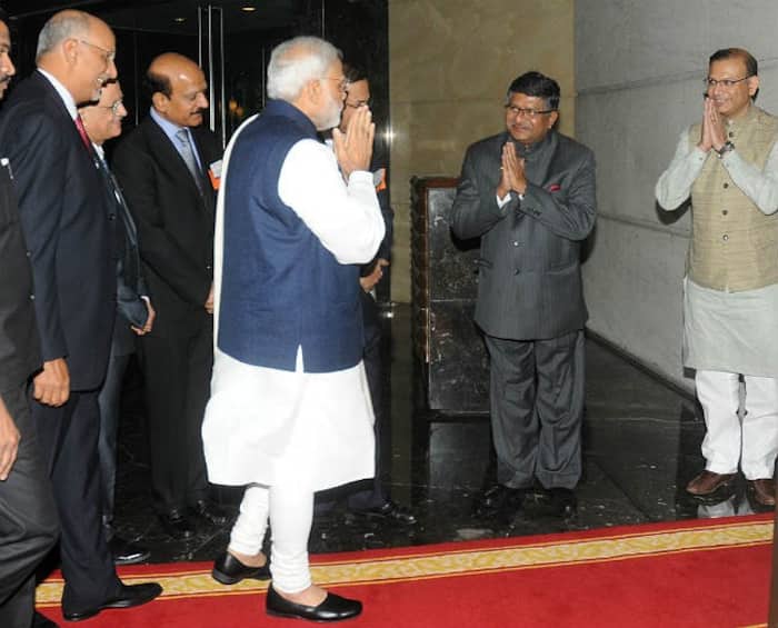 Narendra Modi greeted by Ravi Shankar Prasad and Jayant Sinha during Silver Jubilee Celebration Ceremony of NASSCOM