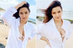 'Tanhaji' Fame Neha Sharma Sets Temperature Soaring With Her Hot Pictures in Unbuttoned Shirt And Olive Green High Thigh Slit Dress