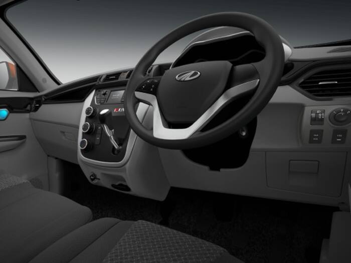 On the inside, the newly launched KUV100 mini SUV gets a dual-tone interior scheme along with piano black finish for the dashboard, driver height adjustable seat, multi-functional steering wheel, cooled glove box, infotainment system with 4 speakers + 2 tweeter and two driving modes- Power and Eco along with Mahindra's Micro Hybrid Technology.