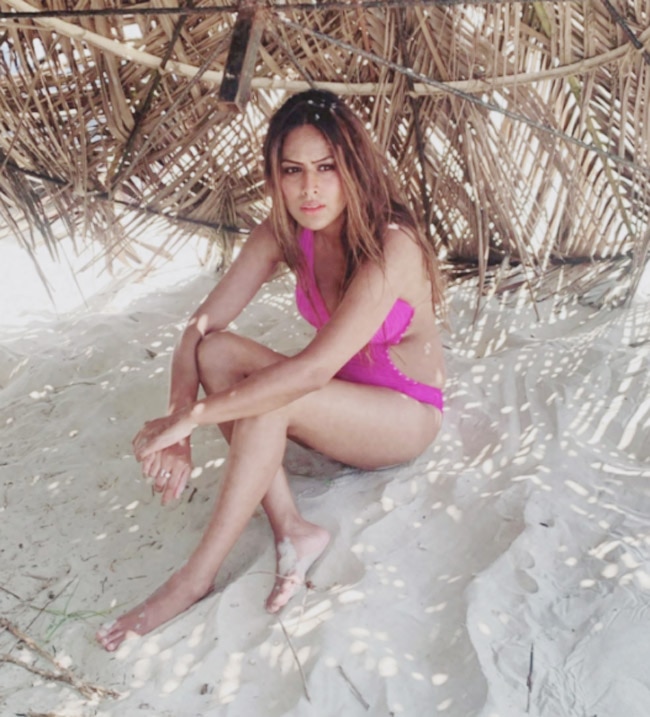 PHOTOS: Nia Sharma hot look in pink bikini