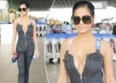 Poonam Pandey Creates Sensation at Airport in Bold Denim Jumpsuit With Unzipped Neckline