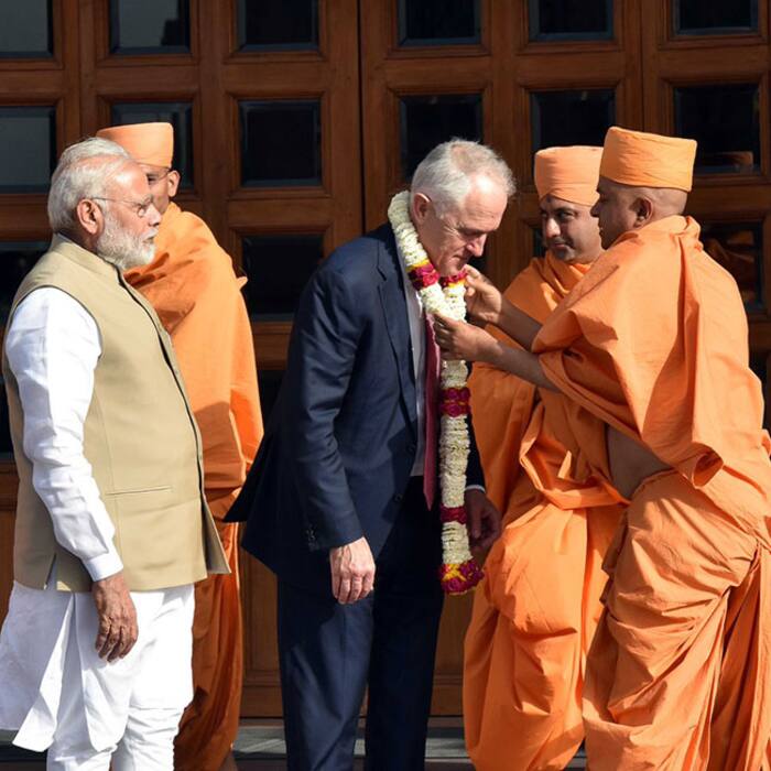 Priests at Akshardham temple welcoming Australian PM Malcolm Turnbull