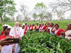 Prime Minister Narendra Modi interacts with women tea workers in Dibrugarh
