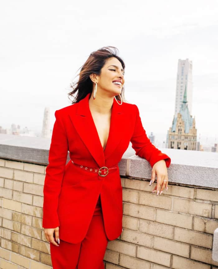 Priyanka Chopra brings Christmas early in her red pantsuit for Matrix promotions